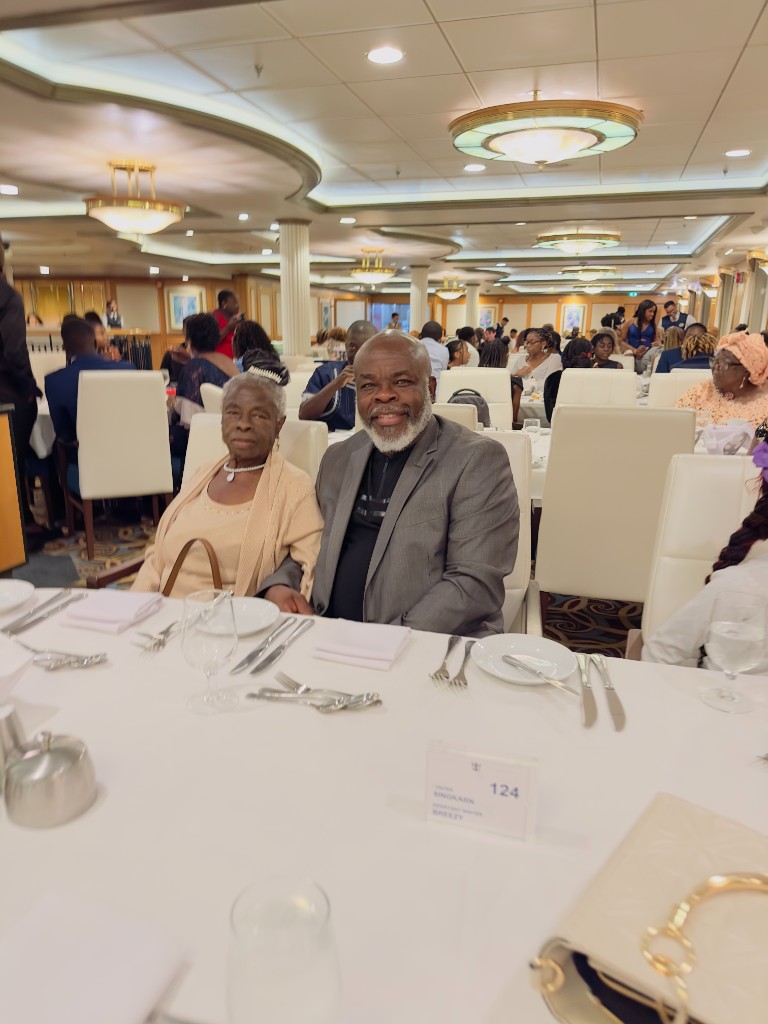 Mama Rose and family at an elegant Royal Caribbean dinner