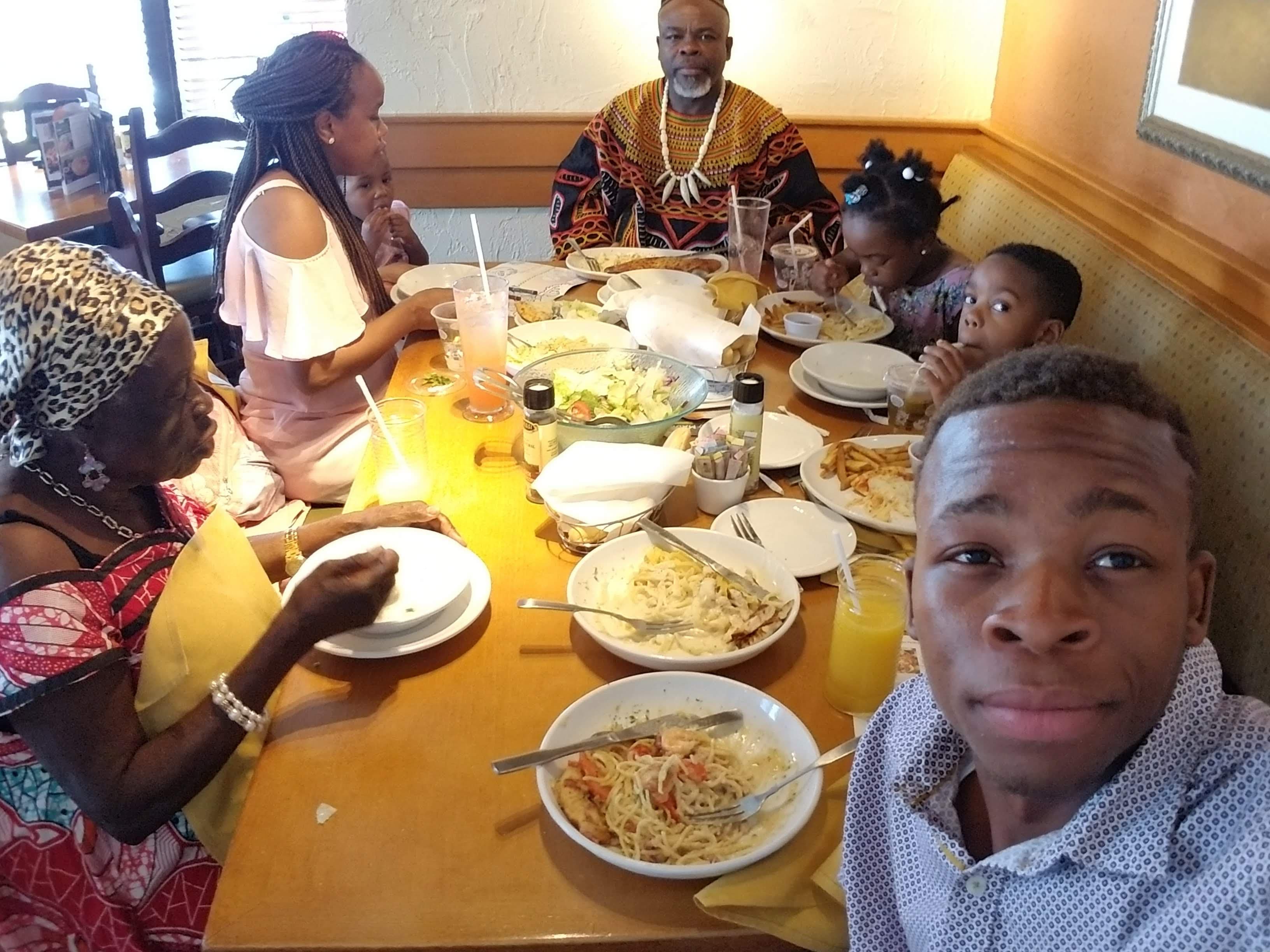 Family meal celebrating together at restaurant