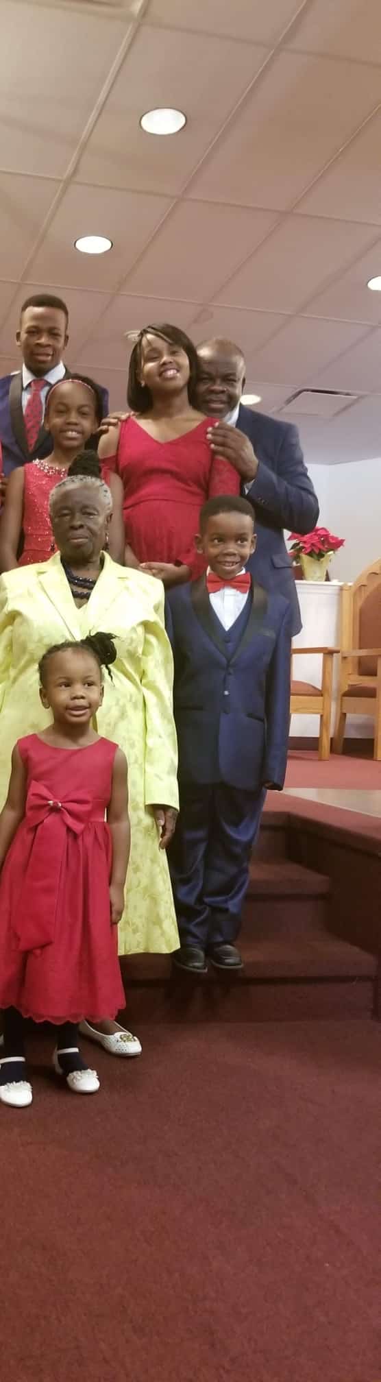 Multi-generational family portrait on church steps