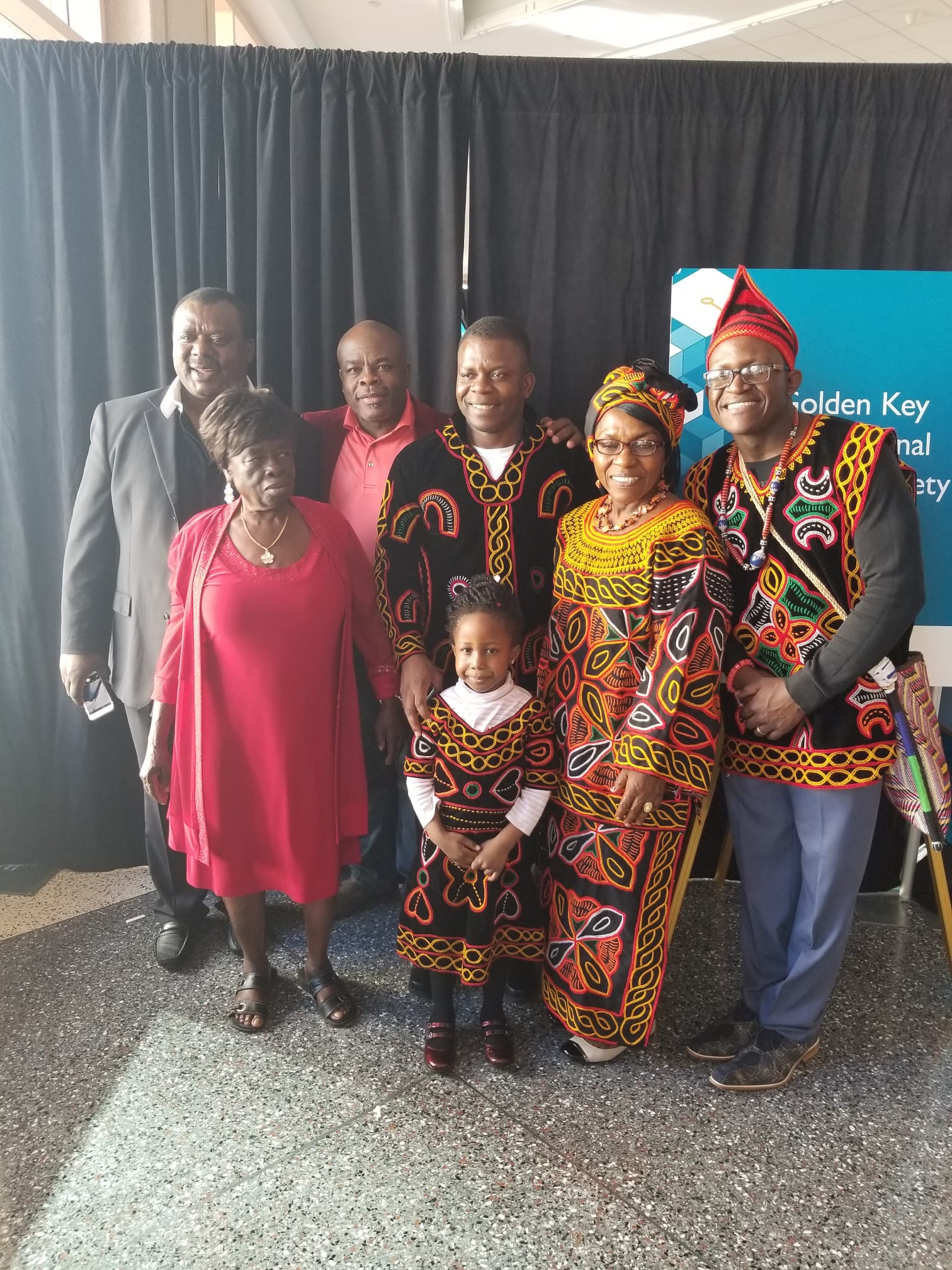 Mama Rose in traditional Toghu regalia at Golden Key honor society